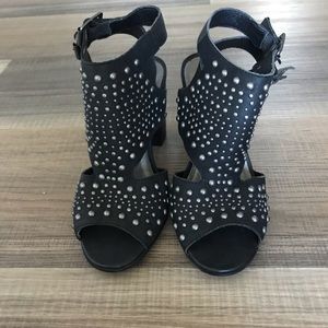 very volatile black heels